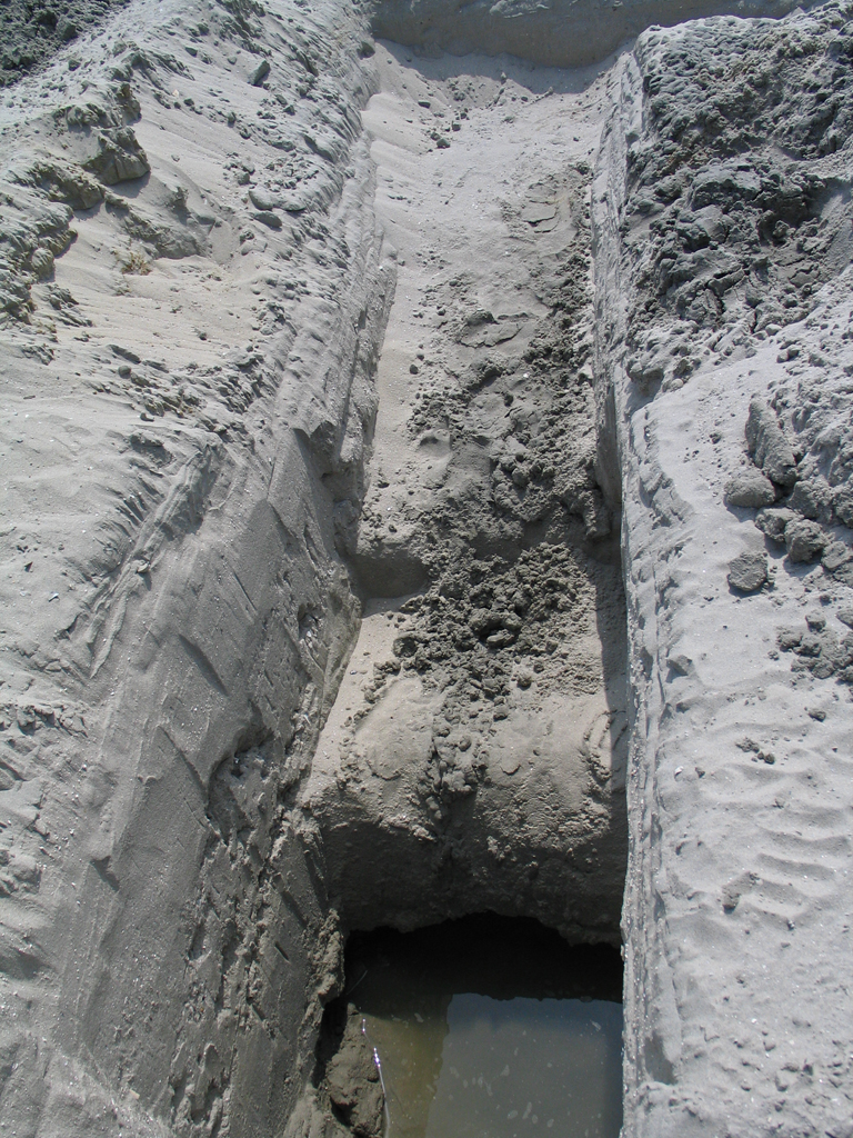 The quarry from which the sand comes.